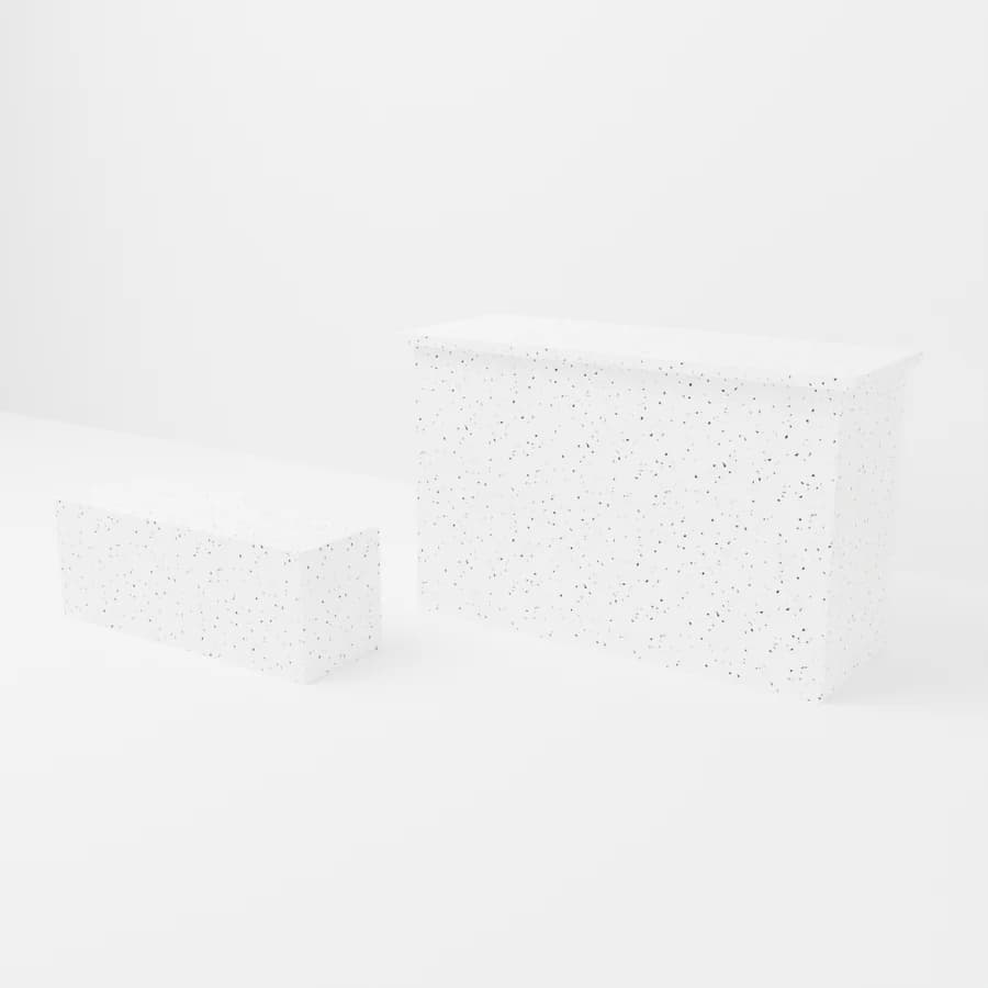 A counter and bench in the “White, black flecks” finish