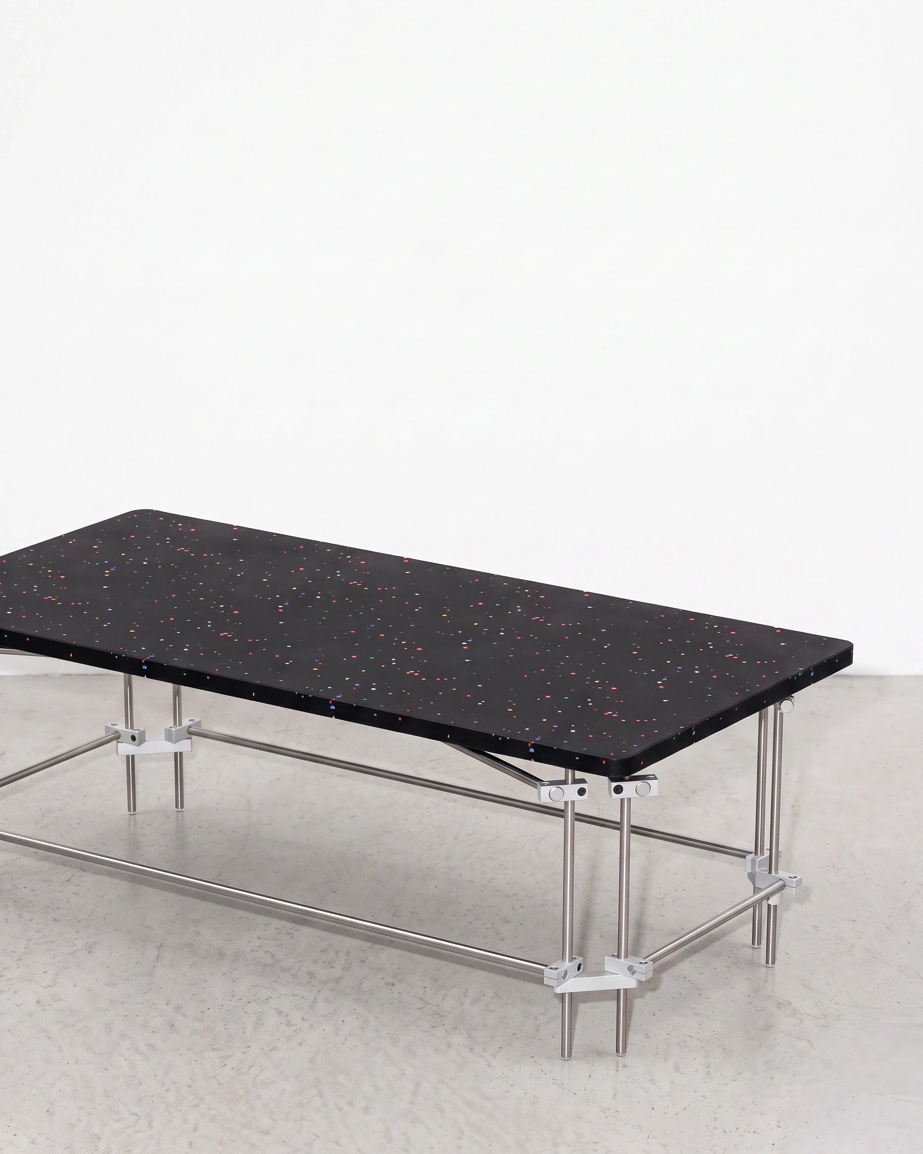 Editor, coffee table 1000, black, colour flecks: front right view