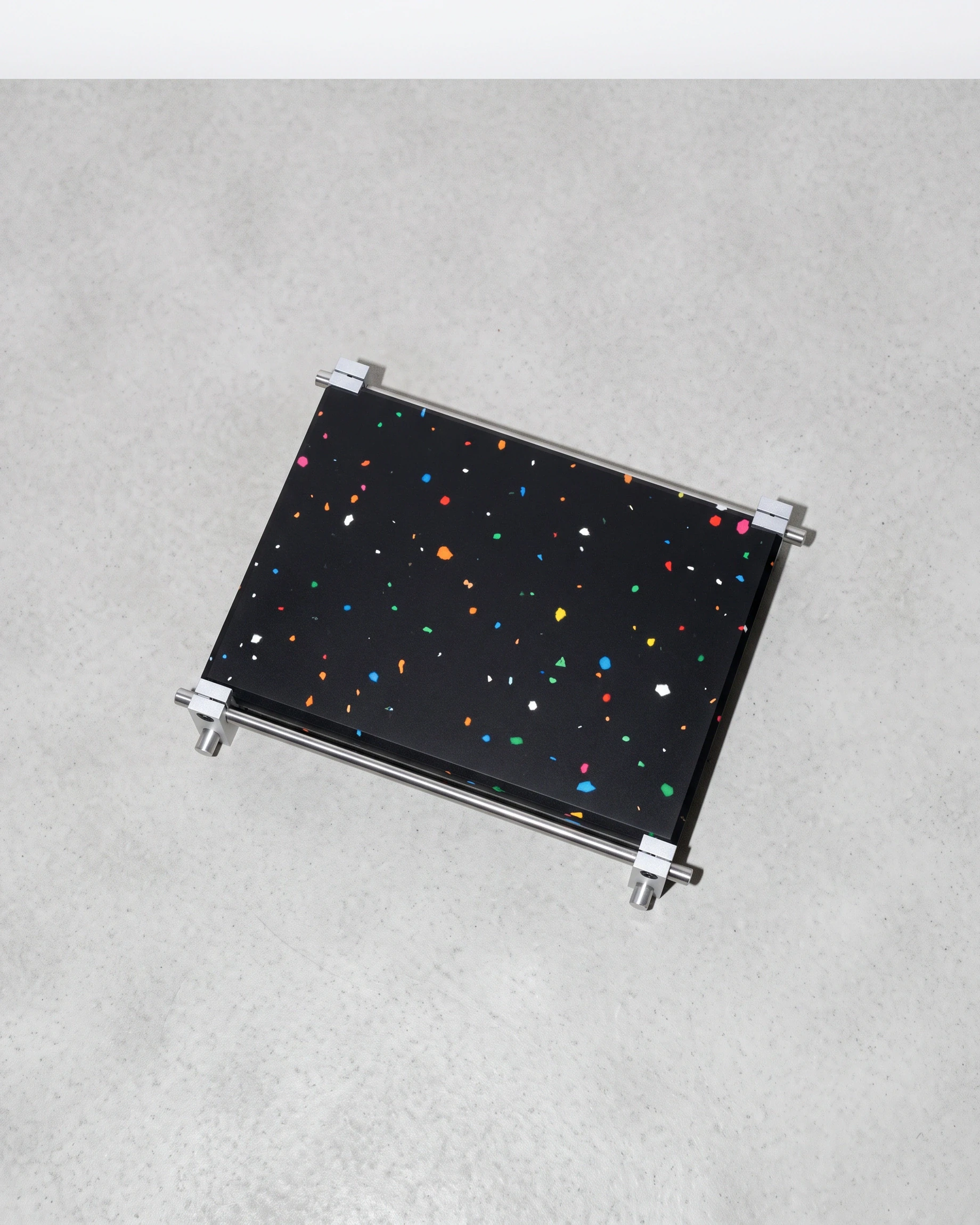 Cashier, organiser 18 × 13, black, colour flecks: top view