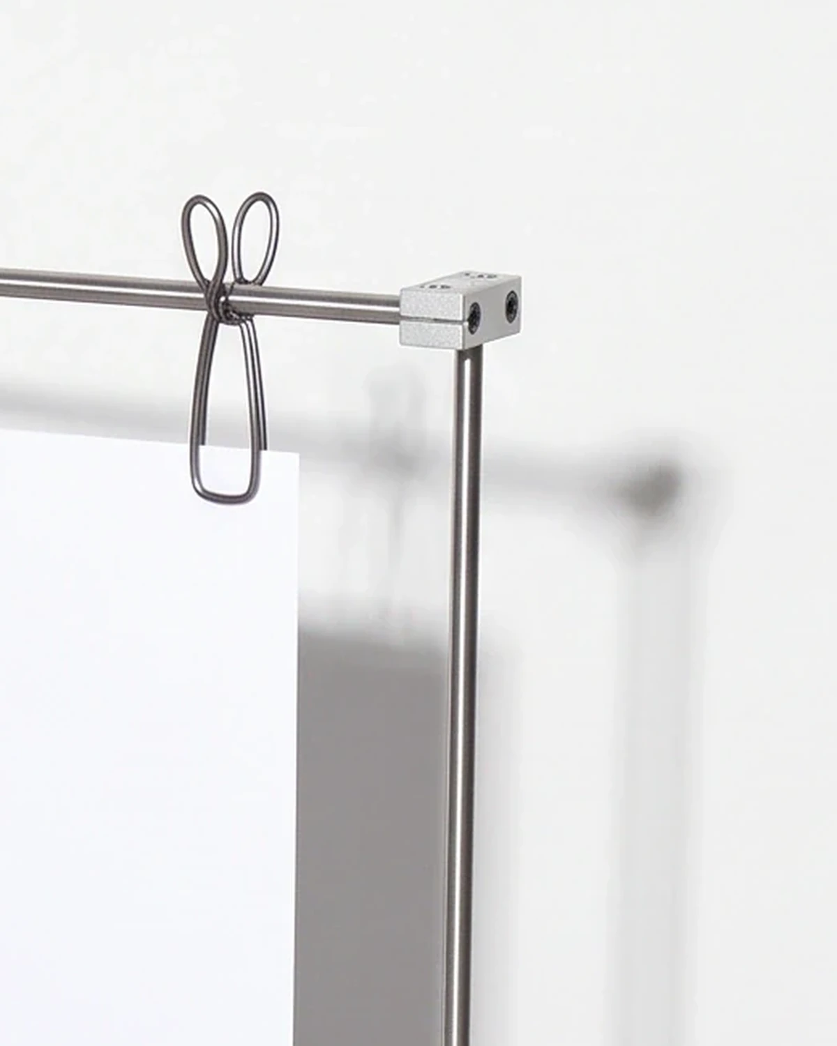 Playbill, clip stand for A4, blue, white flecks: top corner close-up