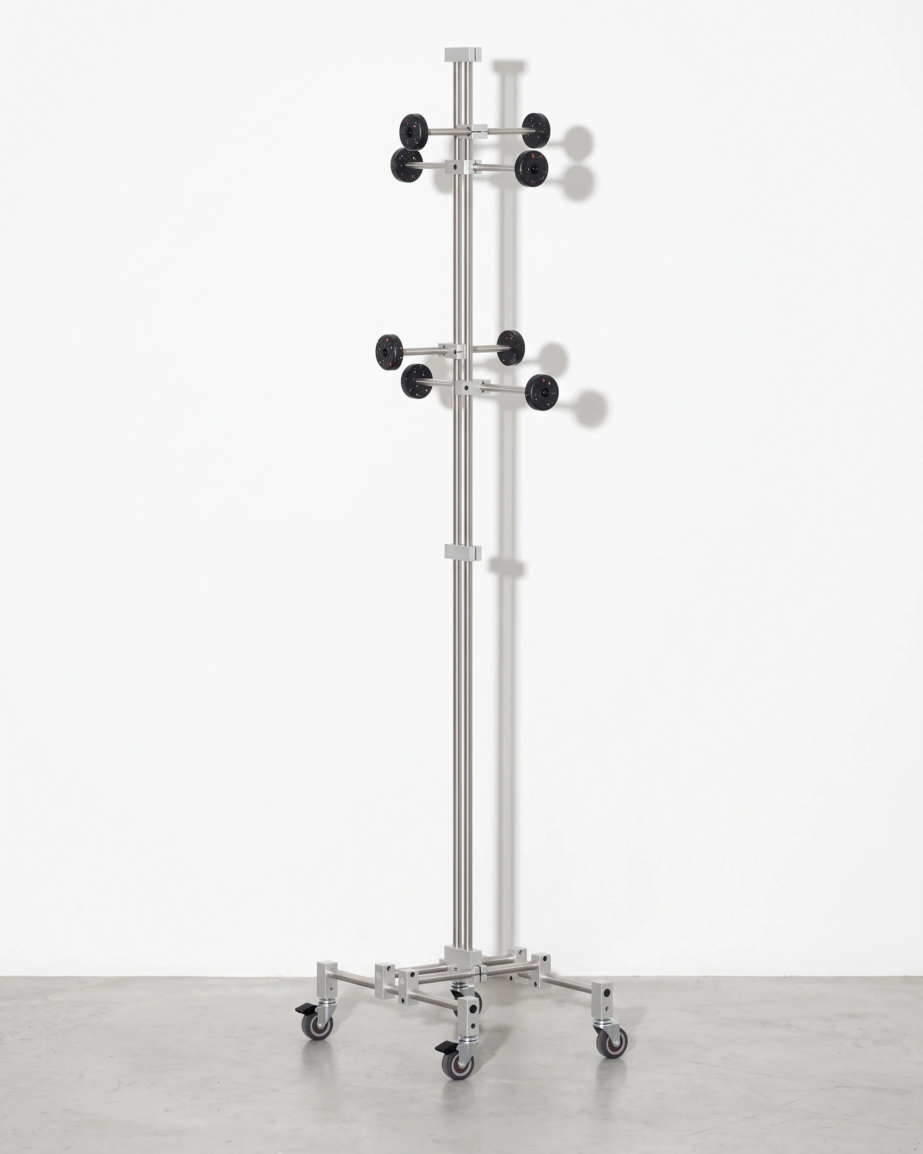 Porter, coat stand on a 30 × 45 base, black, colour flecks: front left view