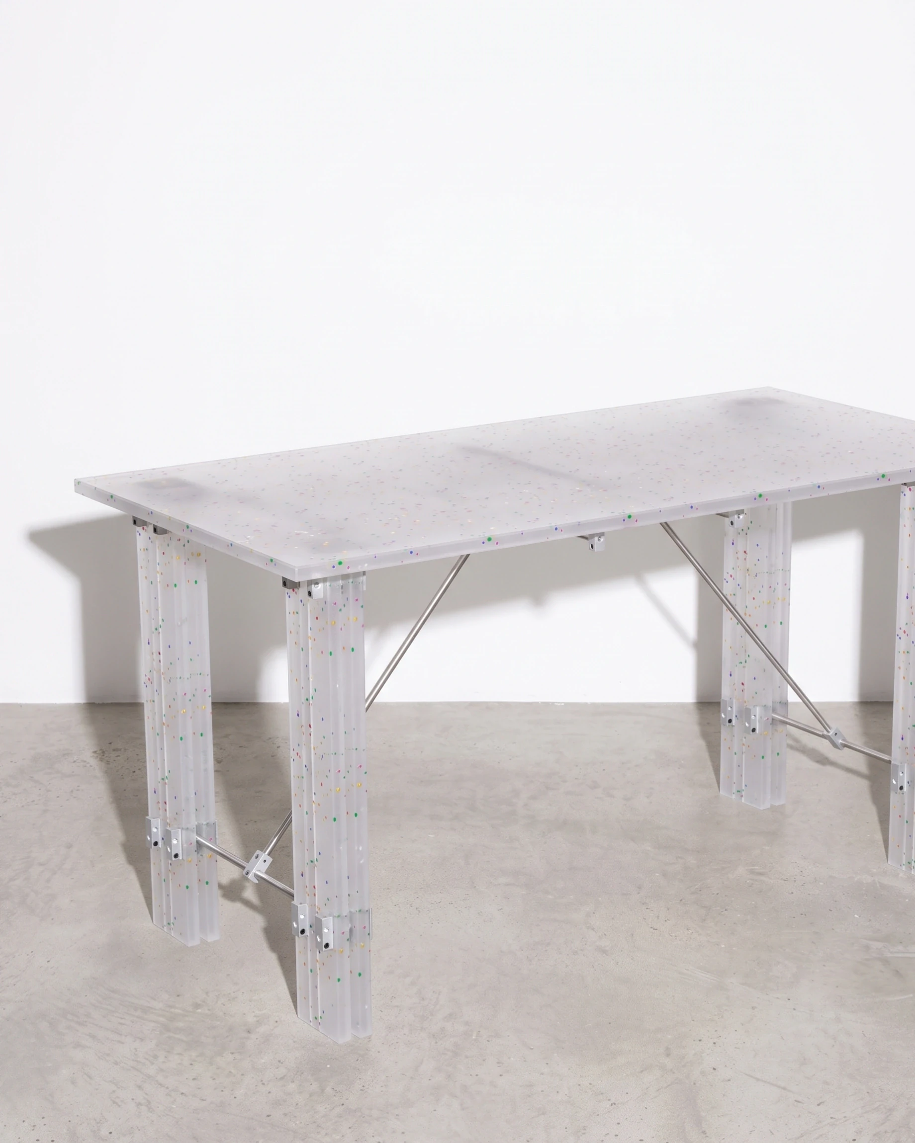 Family Man, table 1400, translucent, colour flecks: front left view